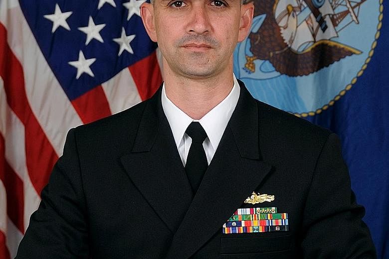 The damage caused to the USS John S. McCain led to the deaths of 10 sailors in August. The destroyer's Commander Alfredo Sanchez (above) faces charges including negligent homicide.