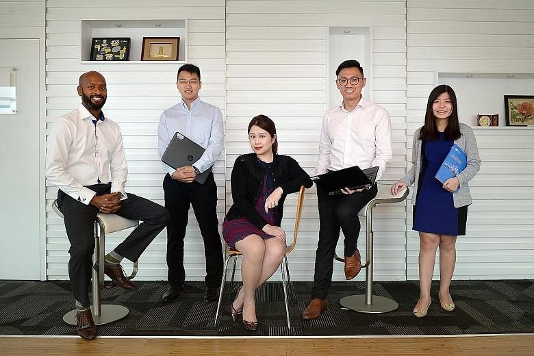Members of the team that investigated the five Japanese electronics manufacturers (from left): Team supervisor and CCS enforcement division director Harikumar Sukumar Pillay, 40; lawyer Wong Chun Han, 28; lawyer and team leader Serene Seet, 37; econo