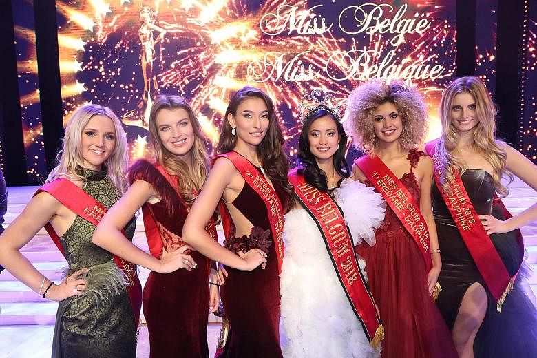 Ms Angeline Flor Pua (third from right), who was born in the Belgian city of Antwerp, has a Chinese-Filipino father and a Filipino mother. She was crowned Miss Belgium on Jan 13, beating 29 other contestants. Many critics have questioned her national