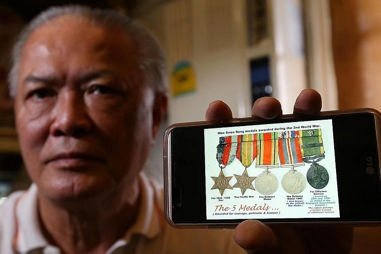 The elder Mr Wee served in a volunteer force during World War II. Mr Tony Wee with an image of the five medals his father won for his service.
