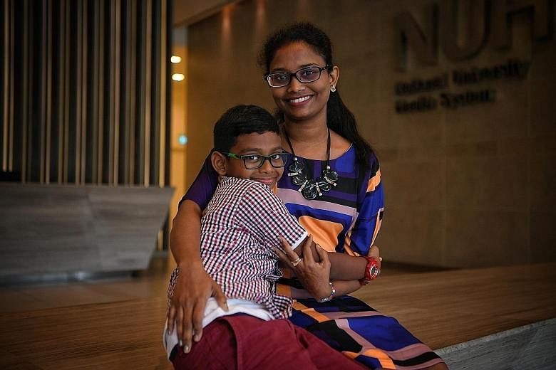 Left: Eight-year-old Marully Ioseff Benjamin and his mother, Madam Mislia Supar, 42, are both part of the Growing Up in Singapore Towards Healthy Outcomes study. Madam Mislia is married to Mr Marully Uhum Reduan, 46, and they have two other children,
