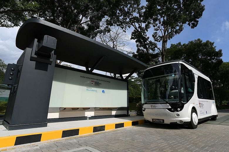 The NTU-Blue Solutions Flash Shuttle - recharging at a stop at the university's Halls of Residence at North Hill - was launched yesterday. It will run a 1km test route with two stops.