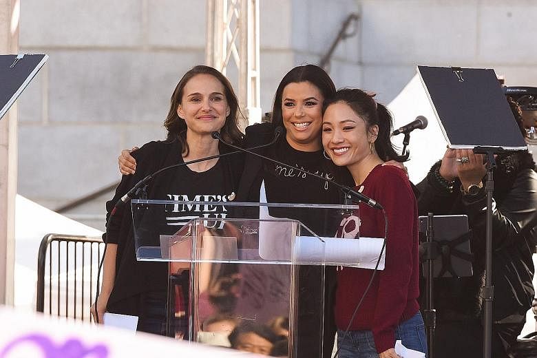 Actresses (from far left) Natalie Portman, Eva Longoria and Constance Wu at Women's March last Saturday in Los Angeles.