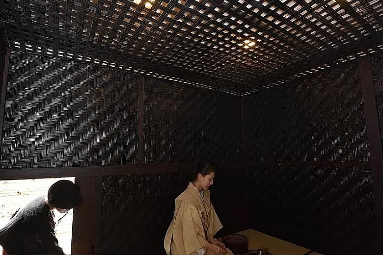 Thai artist Rirkrit Tiravanija designed untitled 2018 (the infinite dimensions of smallness), a small, air-conditioned bamboo tearoom set in a bamboo maze at National Gallery Singapore.
