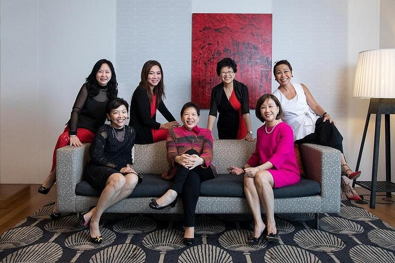 Chief financial officer Yiong Yim Ming (left) and chief sustainability officer Esther An are part of CDL's senior management. The women on DBS' group management committee, who make up 30 per cent of its members, are (from left) Ms Eng-Kwok Seat Moey,