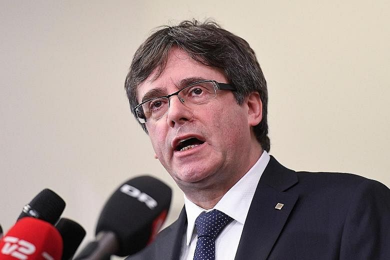 Catalan separatist leader Carles Puigdemont at a press conference in Denmark yesterday. When asked, he did not say when exactly he planned to return to Spain.