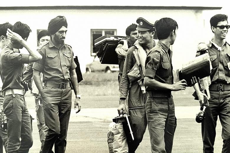 LT Leo Tin Boon (third from right), then a 21-year-old helicopter pilot, back in Singapore with the rest of the Kuantan detachment in 1971. It was the RSAF's - then the Singapore Air Defence Command - first humanitarian assistance and disaster relief