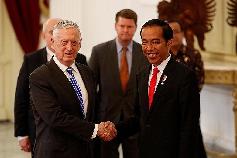 Indonesia's President Joko Widodo welcoming US Secretary of Defence Jim Mattis to the presidential palace in Jakarta yesterday.