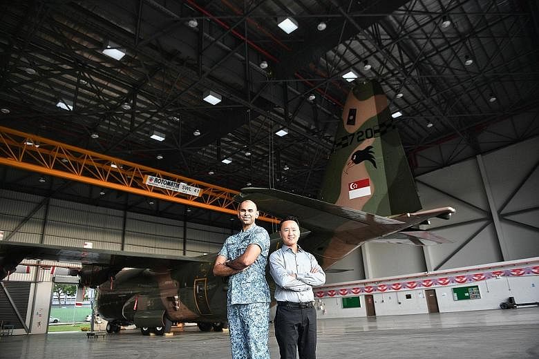 Another military green building is a boat shed at the RSN's Changi Naval Base that is powered by renewable energy from the sun. ME4 Dave Singh and DSTA principal architect Aw Boon Seong at the RSAF's green hangar at Paya Lebar Air Base.