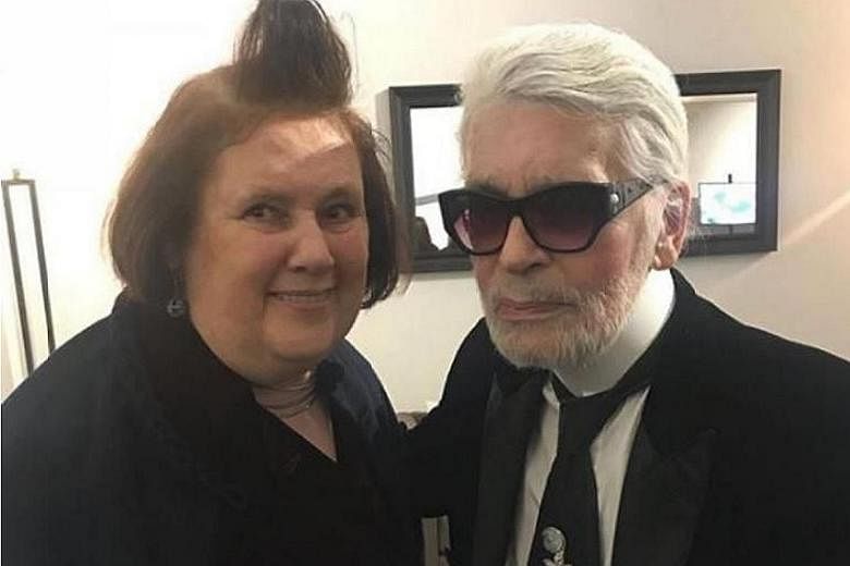 Karl Lagerfeld (with Vogue critic Suzy Menkes) sports a radical new look, his first change in almost 20 years.