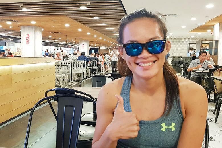 Mixed martial arts fighter Tiffany Teo, during her interview with ST at Junction 8 yesterday, will not train for about a month to recover. She received encouraging messages from friends, fans and even strangers.