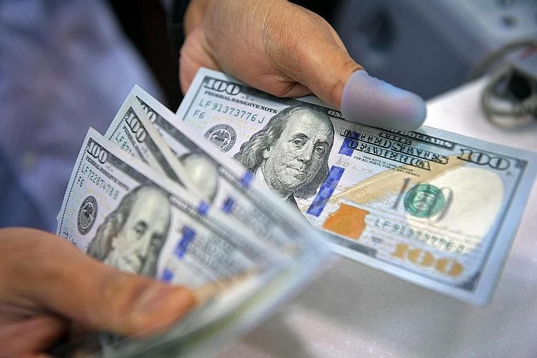 With the greenback falling to a three-year low against the Singdollar, some Singaporeans are rushing to buy the currency for an upcoming holiday in the US, while others are doing so for future trips.