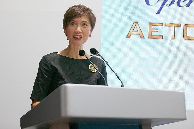 Second Minister for Home Affairs Josephine Teo said the use of technology to carry out routine, labour-intensive tasks allows security officers to focus on tasks that are more complex or require human judgment. Right: The command centre at the new Ae