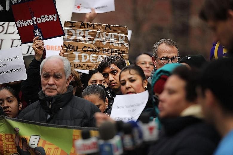Demonstrators, many of them recent immigrants to America, protesting against the government shutdown and the lack of a deal on the Deferred Action for Childhood Arrivals programme, outside Federal Plaza in New York on Monday.