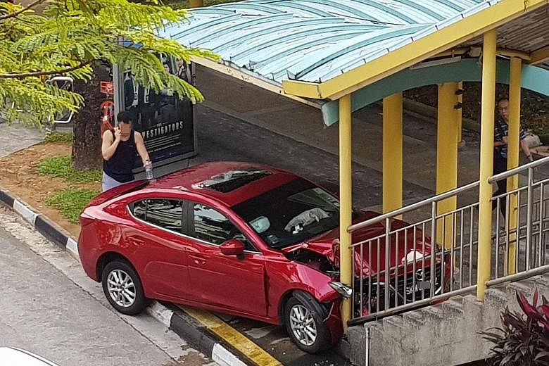 The red Mazda mounted the pavement and came to a stop at the foot of the overhead bridge in Jurong East Central last Friday. The 61-year-old driver was taken to hospital with minor injuries.