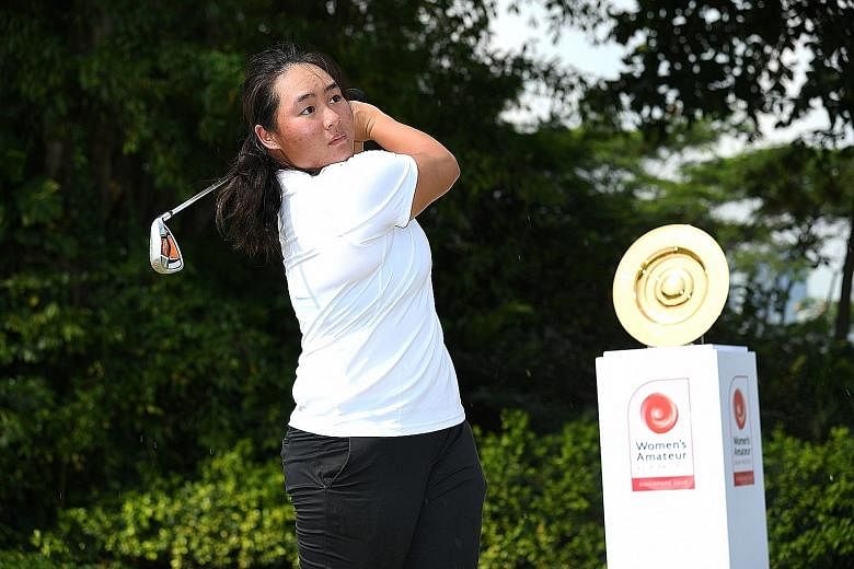 The Women's Amateur Asia-Pacific Championship trophy was unveiled at Sentosa Golf Club yesterday afternoon by two Singaporean competitors in next month's field - Callista Chen (above) and Shannon Tan. The event's winner will also receive invitations 