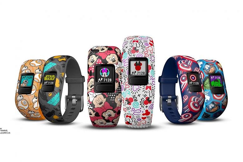 Garmin's Vivofit Jr 2 for kids comes with bands in (from far left) Star Wars, Disney and Marvel designs.