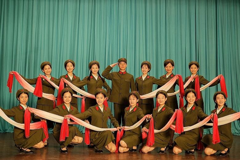 Youth centres on members of a People's Liberation Army arts troupe in the 1970s.