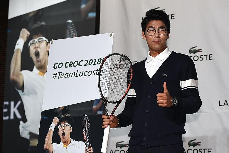 Chung Hyeon posing during a photo session at a press conference in Seoul yesterday. The 21-year-old South Korean said he was looking forward to the French Open in May because he felt that he played well on clay courts last year.