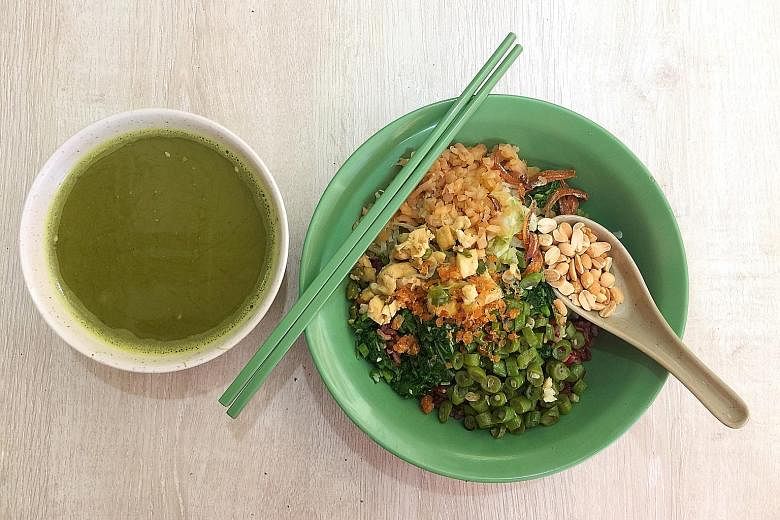 The traditional Hakka tea rice at Berseh Food Centre is a delicious home-style version.