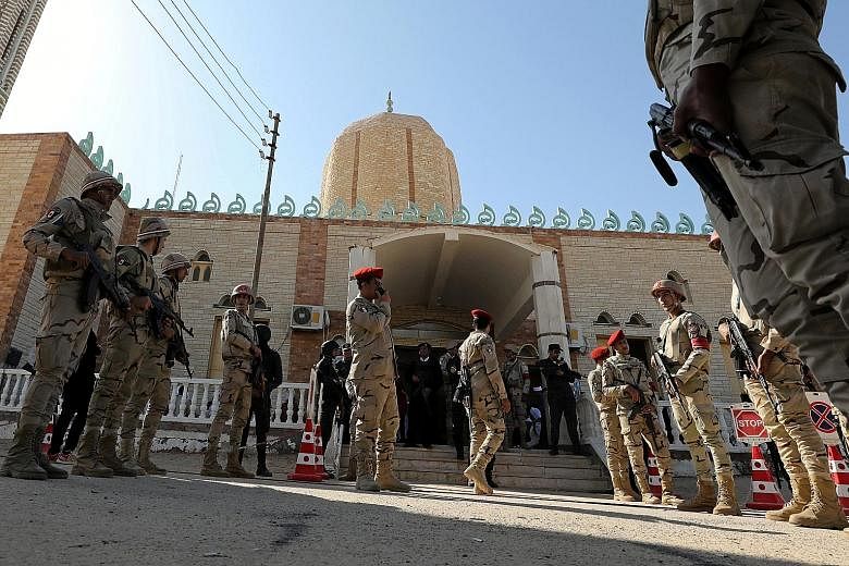 Military security members patrolling outside the Al Rawdah mosque after a terror attack in Bir Al-Abed, in the North Sinai, Egypt, last year. Egypt and Israel are now secret allies in a covert war against a common foe - the militants - after being en