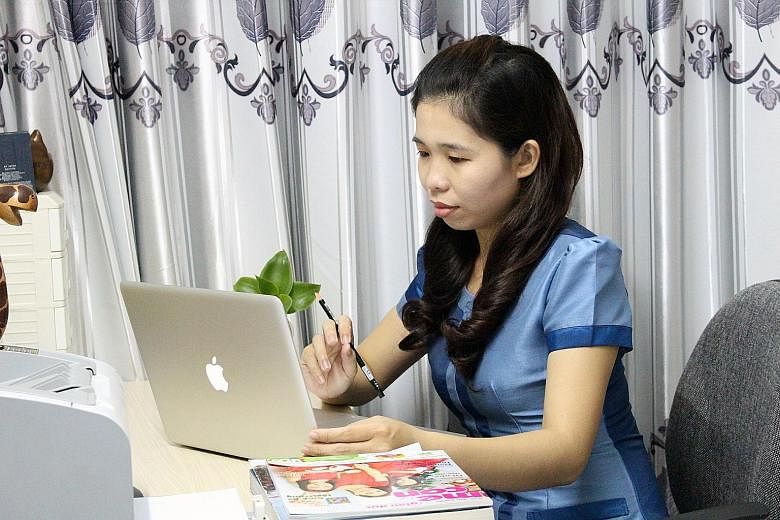 Ms Vuong Thi Minh Thu sells seasonal food like pork sausage, coconut candy and shrimp sauce from her Facebook account. The authorities have identified some 13,000 Ho Chi Minh City-based users selling items on Facebook. But tracing the transactions is