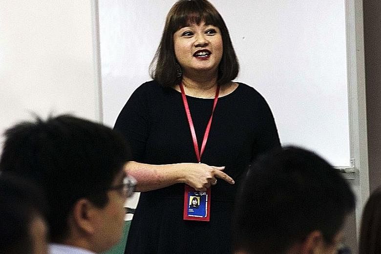 Teaching specialist Debra Ann Francisco introduced ways to get students interested in the news.