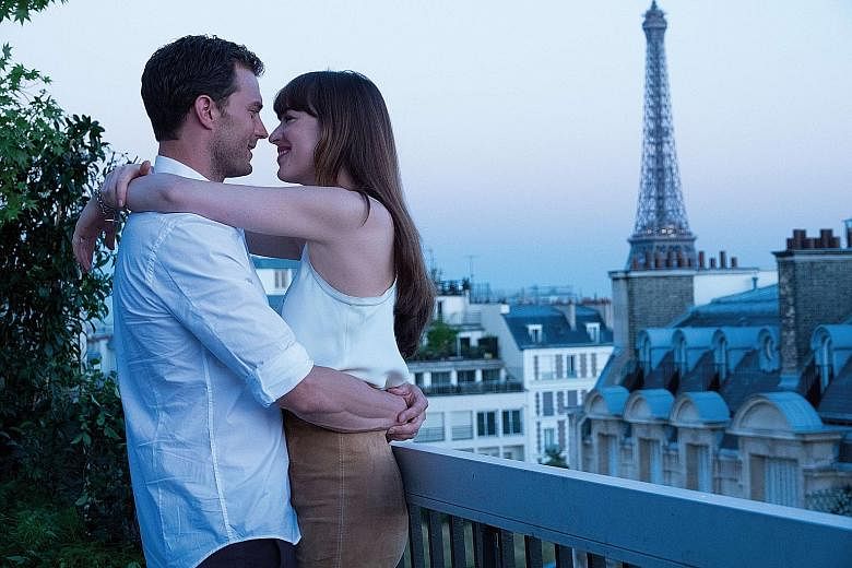 Fifty Shades Freed is directed by James Foley (above) and stars Jamie Dornan and Dakota Johnson (both top).