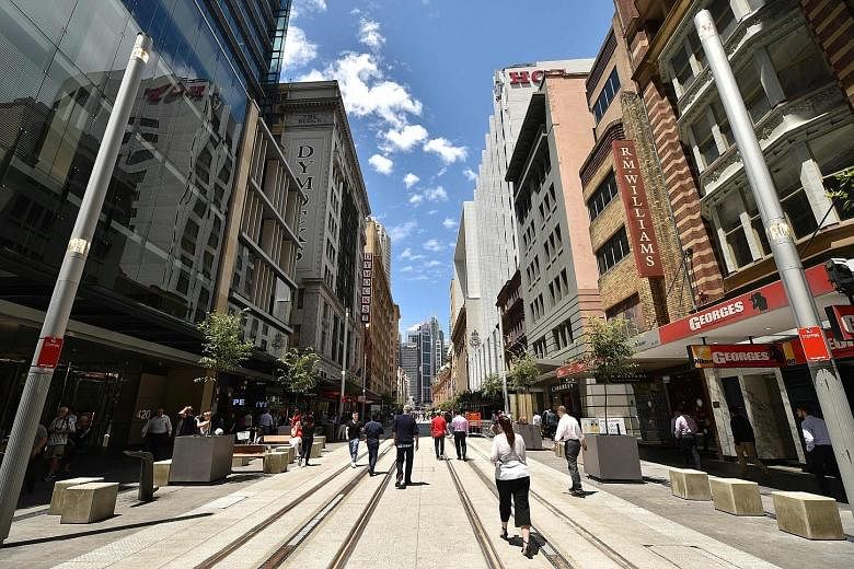 Mr Mark Shaw (left), who has headed the Orchard Road Business Association since 2015, is optimistic that an ongoing study on the shopping precinct will lead to changes that will enliven it. He sees Sydney's George Street (below) as an example of an e