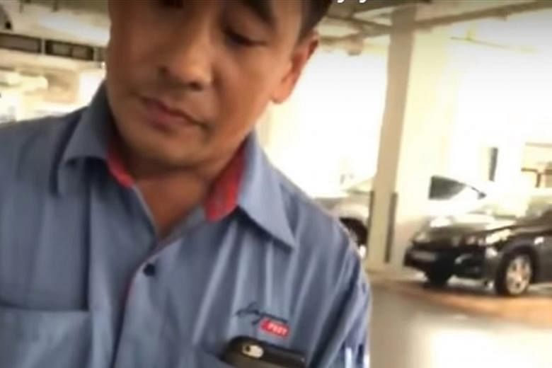 A screengrab from a video that went viral in which a postman was seen being confronted by the video taker. A SingPost spokesman said the incident occurred at a condominium last Wednesday.