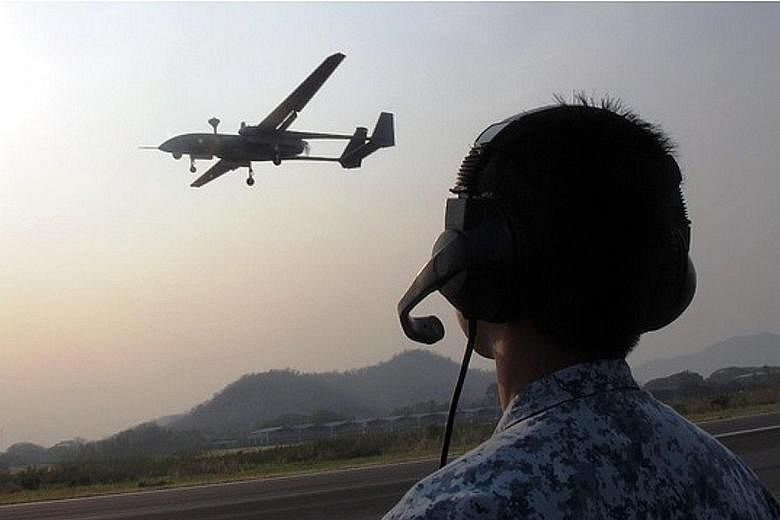 The Heron-1 unmanned aerial vehicle (UAV) in a training exercise in Thailand in 2016. The RSAF first used UAVs in the late 1970s, and upgraded its platforms with the Heron 1 turning fully operational last year.