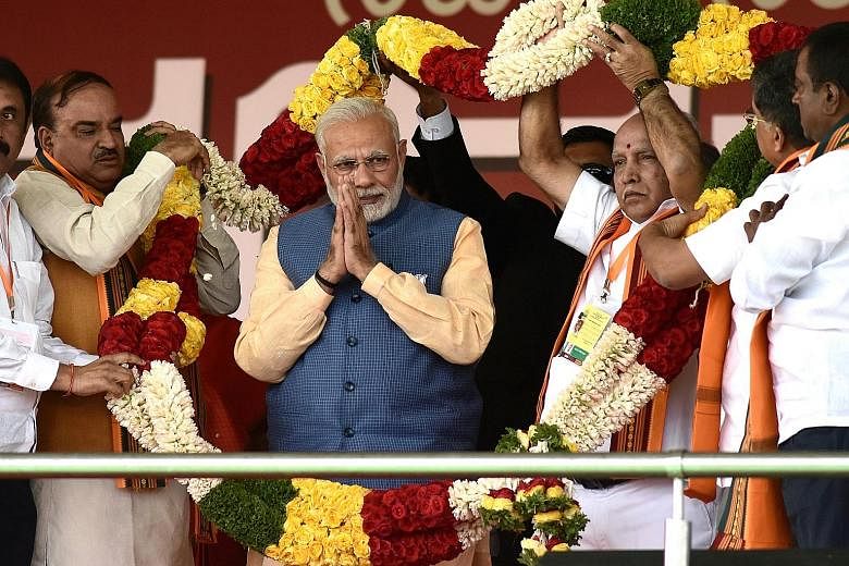 Indian Prime Minister Narendra Modi kicking off the campaign for Karnataka state assembly polls at a rally in state capital Bengaluru on Feb 4.