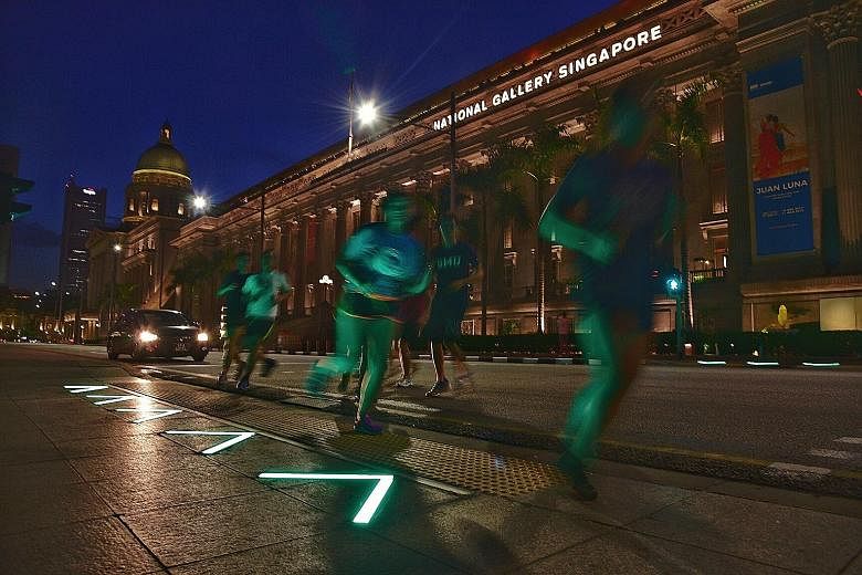 At the St Andrew's Road crossing in front of the National Gallery Singapore, the LED strips have been redesigned with green arrows to be "more intuitive" for pedestrians. The lights are aimed at ensuring all pedestrians, in particular those whose eye