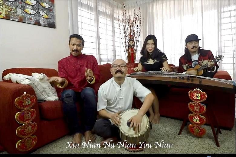 A screen grab of the video showing four Malaysians performing a classic Chinese New Year song with a multicultural twist. Netizens commended the video for its creativity.
