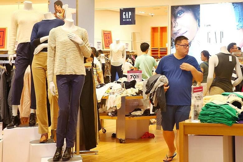 The Gap store at Suntec City yesterday. FJ Benjamin Group chief executive Nash Benjamin had said in an interview last October that it intended to discontinue the franchise business for its loss-making brands, and shut its 20 Gap and Banana Republic s