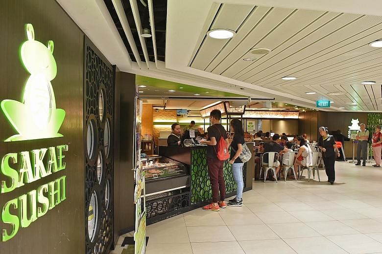The Sakae Sushi outlet in Junction 8 mall. The group cut administrative expenses by 22 per cent during the fourth quarter, partly owing to a $5 million drop in labour costs.