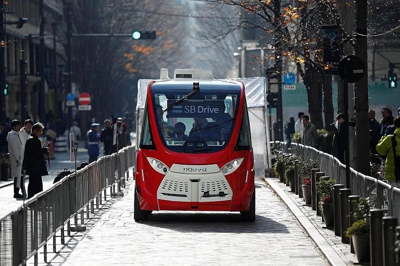 A self-driving bus in Japan. Even as the number of autonomous cars on US roads multiplies, there is still no serious discussion of their shortcomings, says the writer who identifies five key problems.