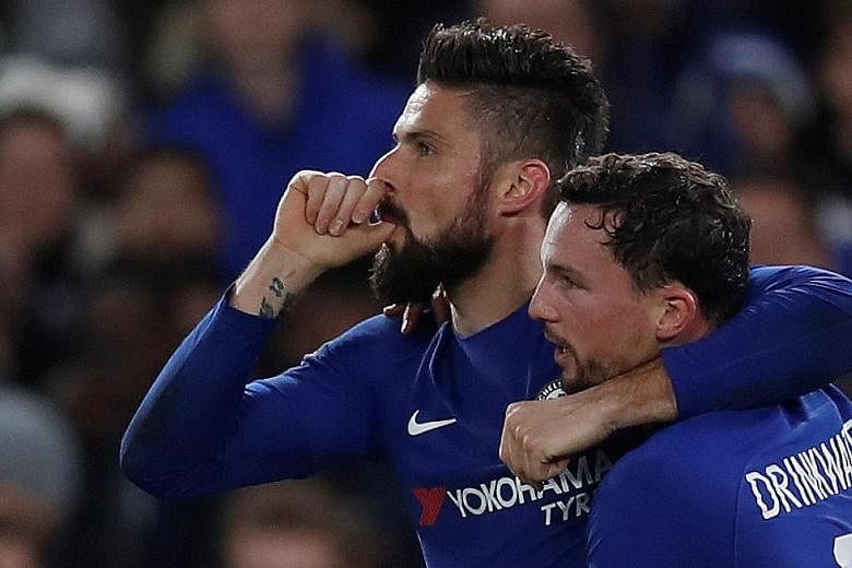Olivier Giroud, whose wife recently gave birth to their third child, celebrating with Danny Drinkwater after scoring Chelsea's fourth goal against Hull at Stamford Bridge in the FA Cup fifth round on Friday.