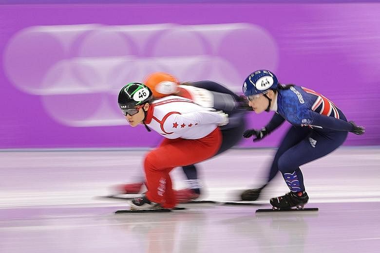 Cheyenne Goh during her short track speed skating 1,500m heat at the Gangneung Ice Arena yesterday. She lost momentum after losing her balance and finished fifth, failing to qualify for the semi-finals.