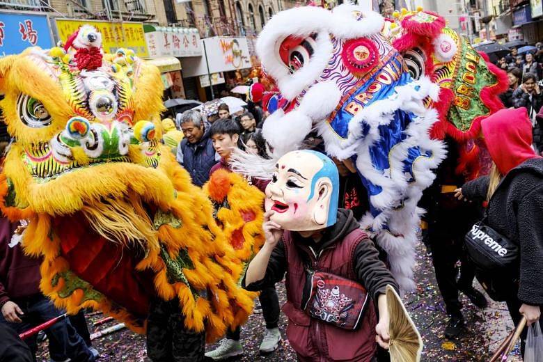 US: Lion dancers in Manhattan's Chinatown all set to give a roaring welcome to the new year. 