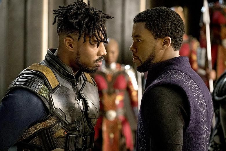 Michael B. Jordan (left) plays Erik Killmonger and Chadwick Boseman as T'Challa in Black Panther.