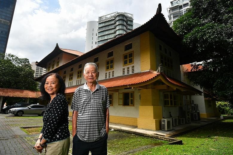 Ms Angela Liong and Mr Adrian Lim on the premises of 126 Cairnhill Road. They are hoping the building, built in 1925, can be gazetted for conservation.
