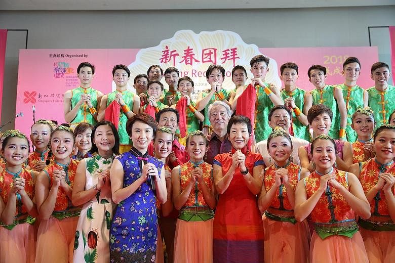 Deputy Prime Minister Teo Chee Hean (centre) with performers from River Valley High School's Dance Society at the Singapore Chinese Cultural Centre yesterday. With him were MacPherson MP Tin Pei Ling; Fengshan MP Cheryl Chan; Senior Parliamentary Sec