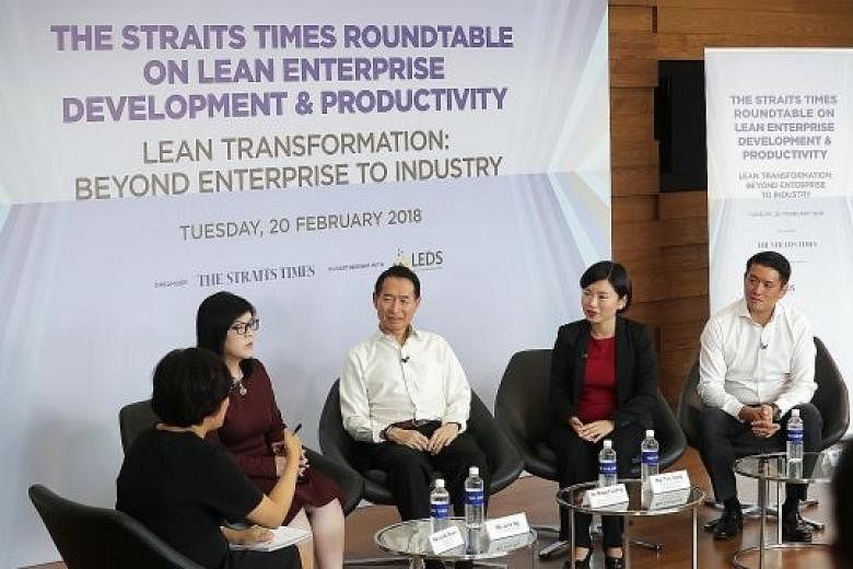 At the roundtable yesterday were (from left) ST business editor Lee Su Shyan, who was the moderator; Ms Julia Ng Lee Hoon, co-chair of the LED task force; Association of Early Childhood and Training Services chairman Robert Leong; La Belle Couture ma
