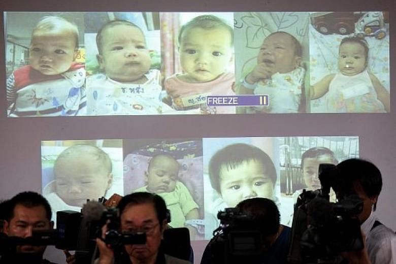 Photos of the surrogate babies were shown by the Thai police at a news conference in 2014. The scandal at the time shone an international spotlight on Thailand's largely unregulated surrogacy business, prompting the authorities to crack down on such 
