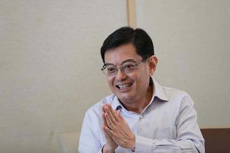 As for when exactly the GST hike will take effect, Finance Minister Heng Swee Keat said it depends on the economy and financial markets.
