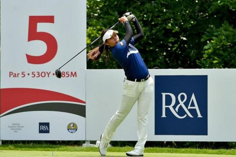 Thai golfer Atthaya Thitikul on her way to firing an opening six-under 65 yesterday to lead the Women's Amateur Asia-Pacific golf championship. The 15-year-old has been in remarkable form, becoming the world's youngest winner on any professional golf