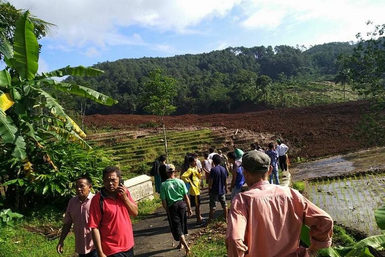 Landslide In Indonesia Leaves 14 Injured; 11 Still Missing | The ...