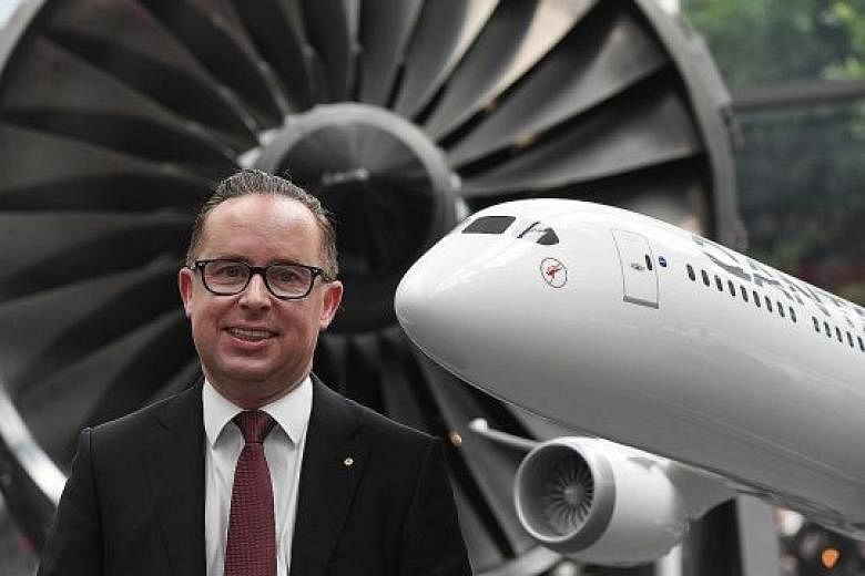 Qantas chief executive officer Alan Joyce announcing the company's half-year financial results in Sydney yesterday. He was upbeat about future earnings prospects, noting that Australia's all-important resource sector was growing for the first time in