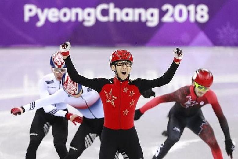 Wu Dajing is ecstatic after winning the thrilling 500m short-track speed skating final in a world record at the Gangneung Ice Arena last night. It was China's first gold of these Winter Olympics.